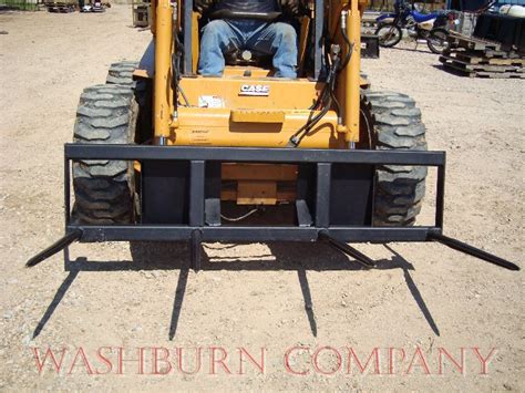 bale spear for skid steer|skid steer hay bale spear.